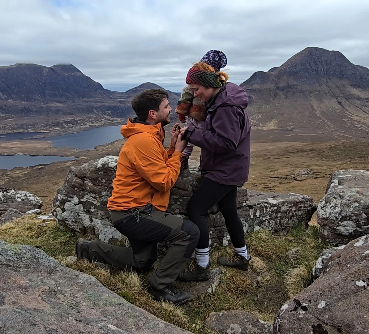 Chris proposing to Gemma in the mountains